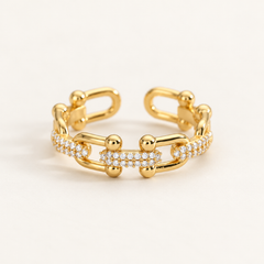 Bague DIARRA en acier inoxydable doré, maillons et strass