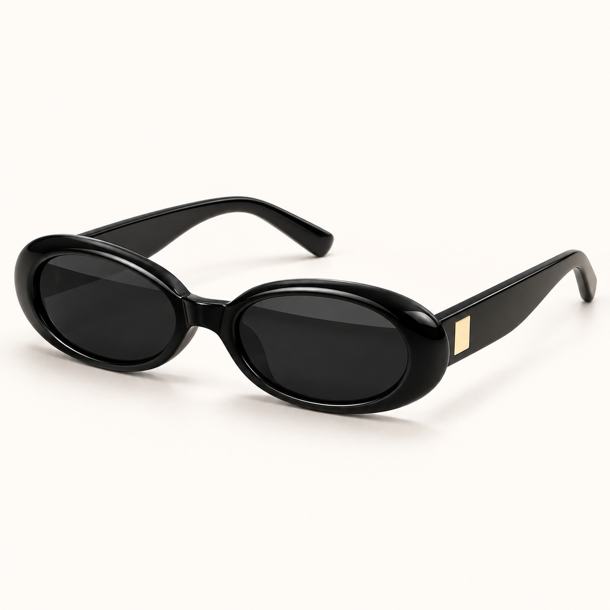 Lunettes SOFIA noires, monture ovale et détail doré sur les branches