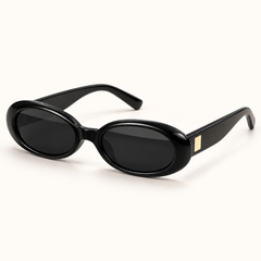 Lunettes SOFIA noires, monture ovale et détail doré sur les branches